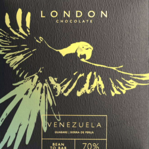 Front packaging of London Chocolate 70% Venezuela Guasare with black background and a sketch of a bird in yellow and green